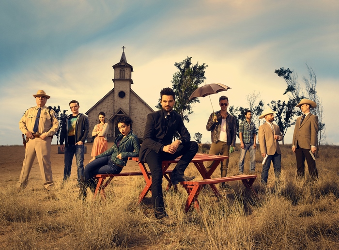 Dominic Cooper and cast from Preacher in front of a church