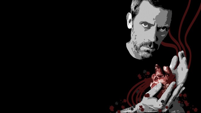 Hugh Laurie holding a bloody heart