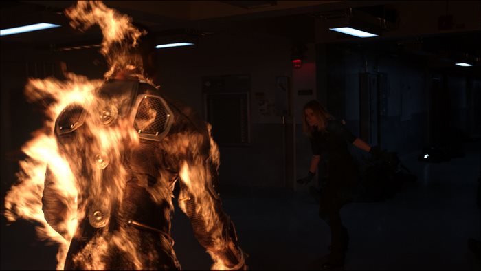 Human Torch and Invisible Woman in hallway