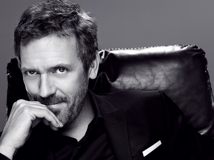 Hugh Laurie in a black suit