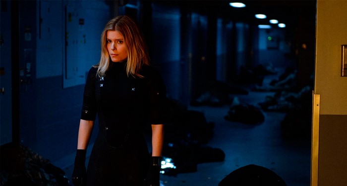 Kate Mara in a dark hallway