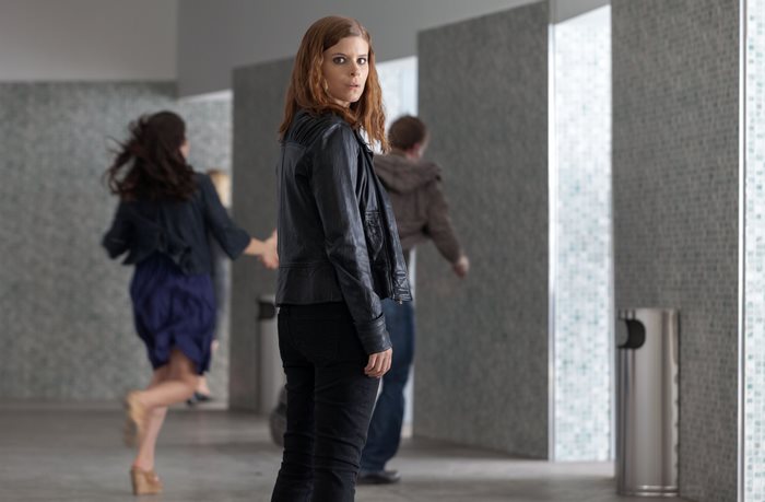 Kate Mara in a hallway