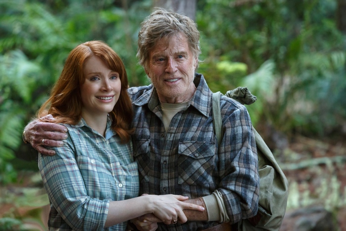 Bryce Dallas Howard and Robert Redford in a forest