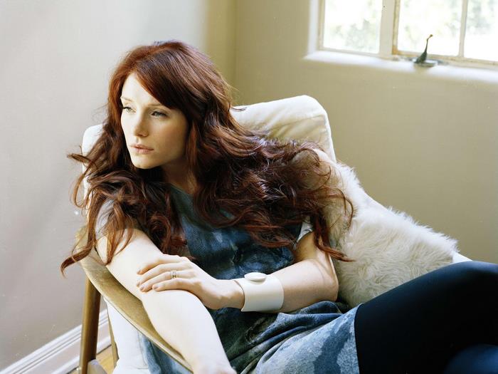 Bryce Dallas Howard sitting in a chair