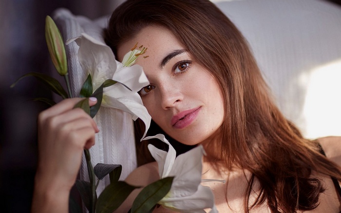 Woman with white lilies