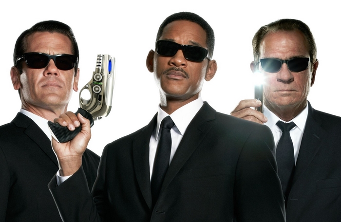 Men in Black Agents with Sunglasses and Weapons