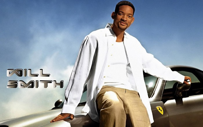 Will Smith posing with a Ferrari
