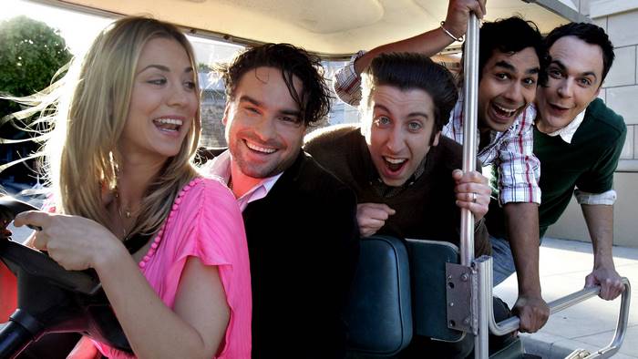 The Big Bang Theory cast in a golf cart