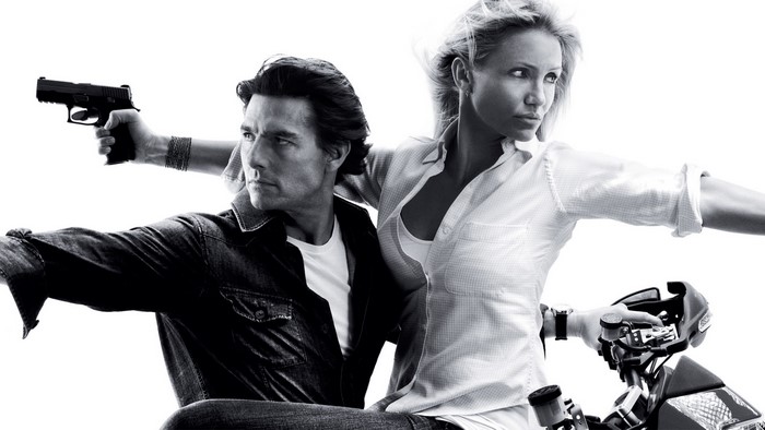 Cameron Diaz and Tom Cruise on a motorcycle