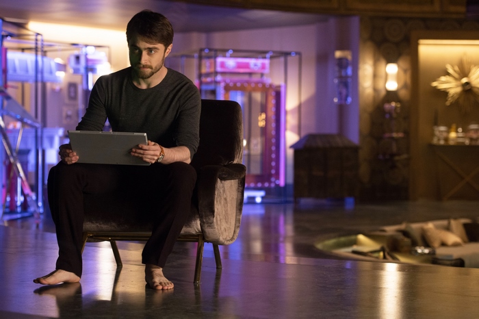 Daniel Radcliffe holding a tablet