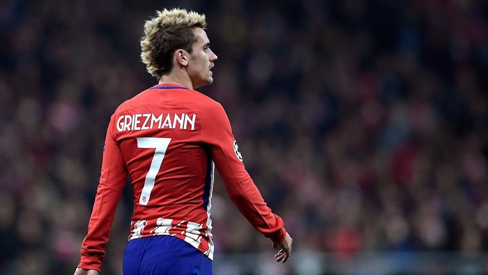 Antoine Griezmann wearing Atletico Madrid jersey