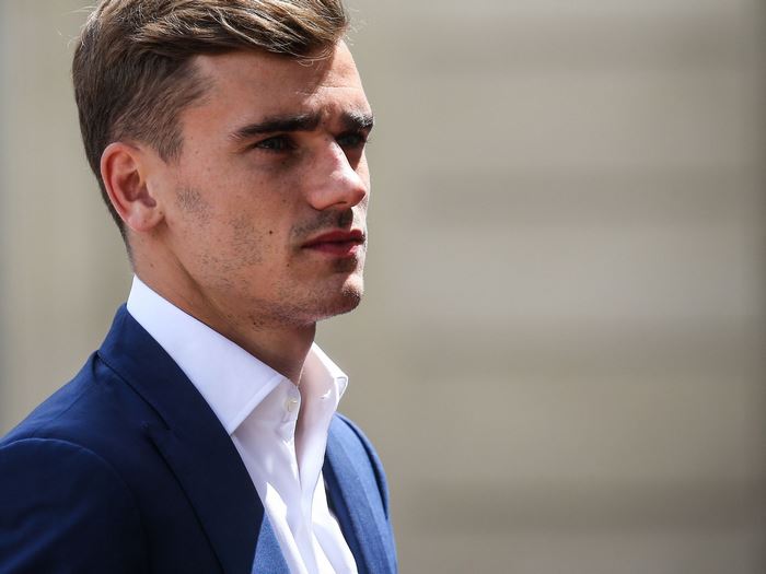 Antoine Griezmann in a blue suit
