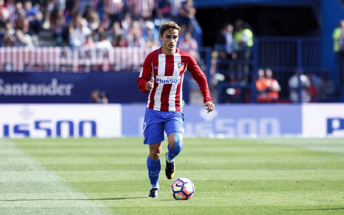 Antoine Griezmann playing soccer for Atletico Madrid