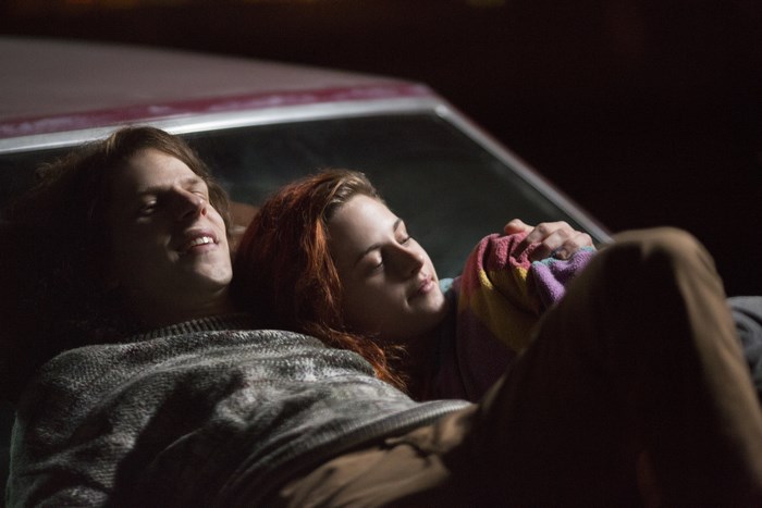 Jesse Eisenberg and Kristen Stewart lying down