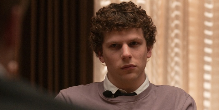 Jesse Eisenberg in a purple sweater