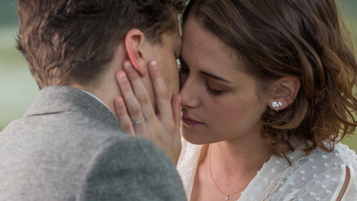 Jesse Eisenberg and woman in intimate moment