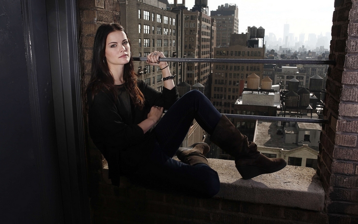 Jaimie Alexander on a rooftop overlooking New York City