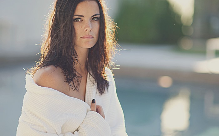 Jaimie Alexander in a white robe