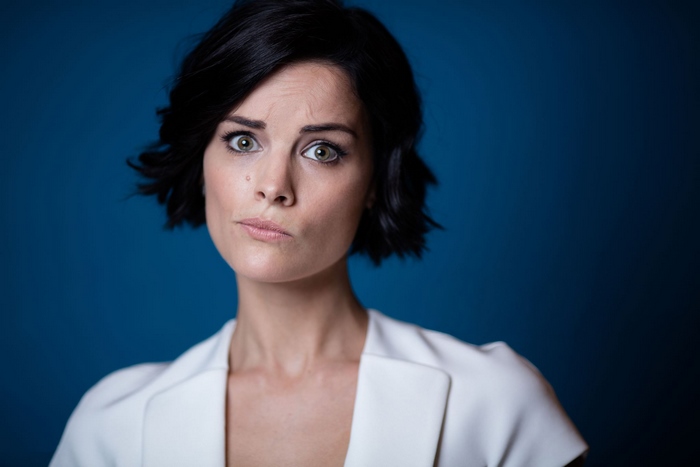 Jaimie Alexander with Short Black Hair in White Blazer