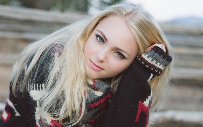 AnnaSophia Robb wearing a patterned sweater