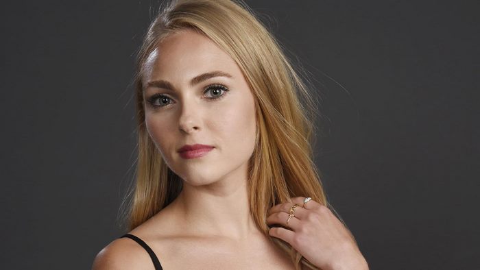 Portrait of AnnaSophia Robb with Blonde Hair and Rings