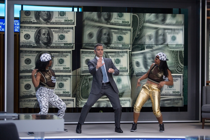 George Clooney and dancers in front of money background