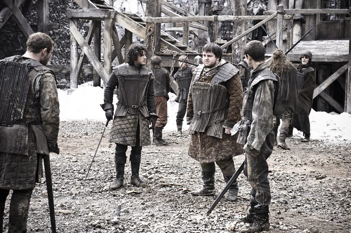 John Bradley and other men in armor