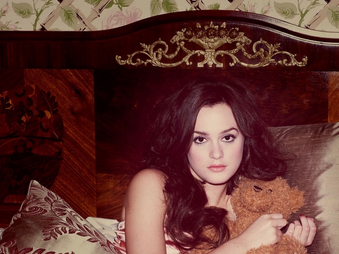 Leighton Meester with a teddy bear in bed