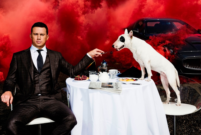 Channing Tatum and dog at a table