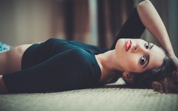Woman lying on the floor
