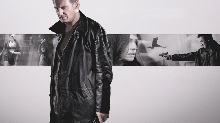 Liam Neeson in a black leather coat