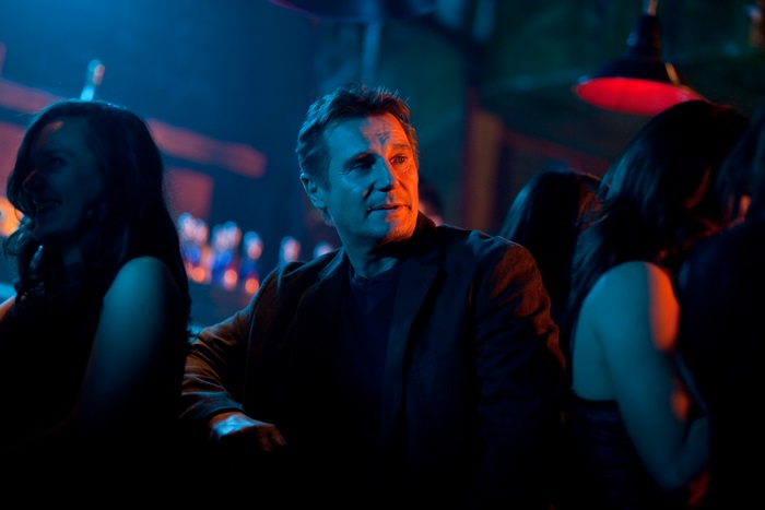 Liam Neeson in a dimly lit bar