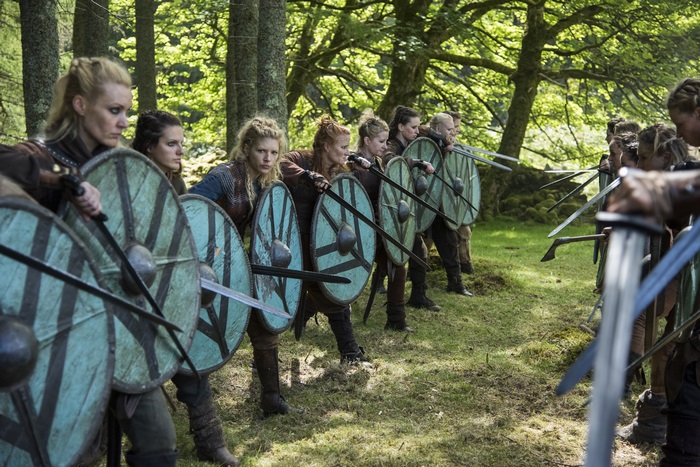 Women Vikings with Shields and Swords in Forest