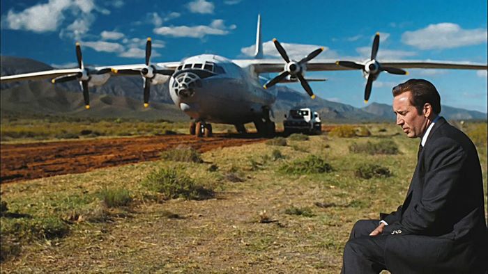 Nicolas Cage in front of an airplane