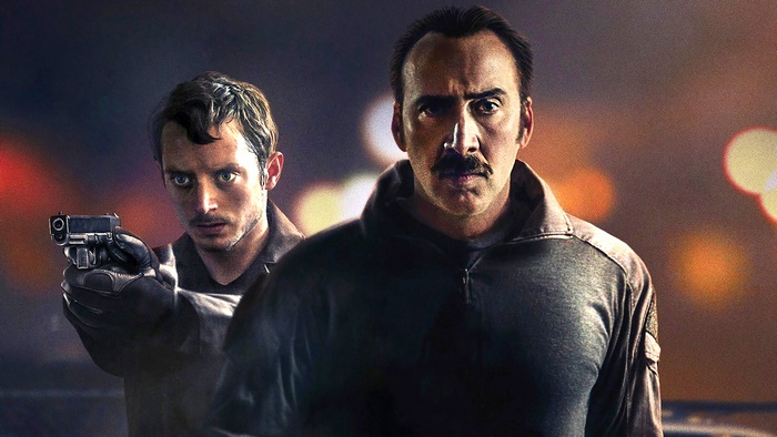 Nicolas Cage and Elijah Wood in a scene