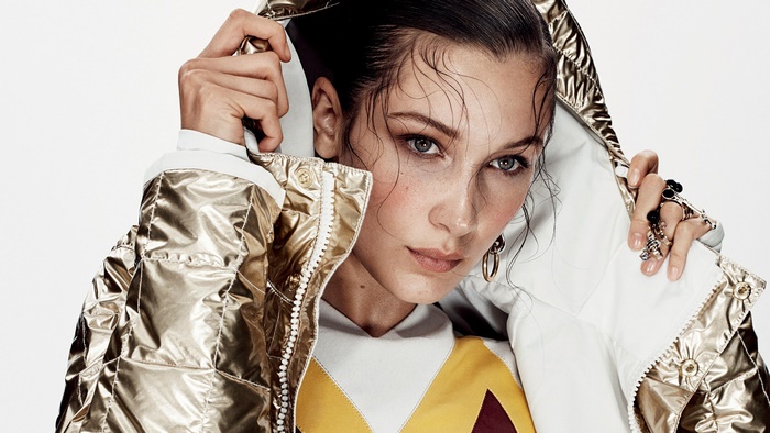 Bella Hadid in a gold puffer jacket