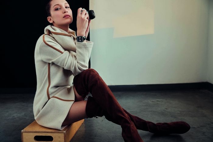 Bella Hadid holding a camera