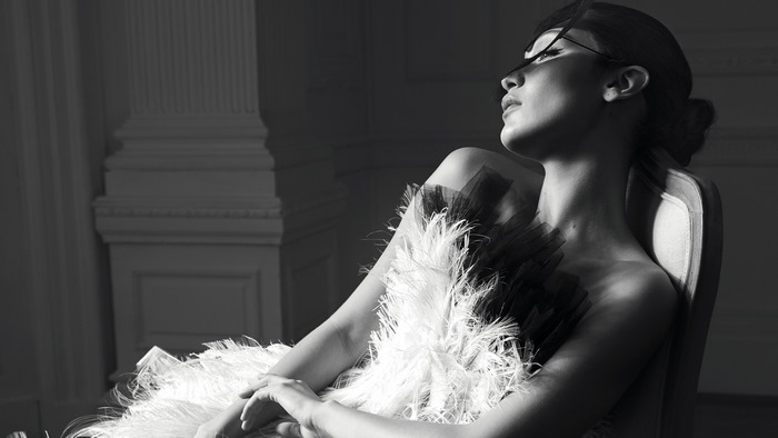 Bella Hadid in a feathered dress