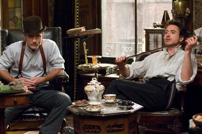Sherlock Holmes and Dr. Watson in a study
