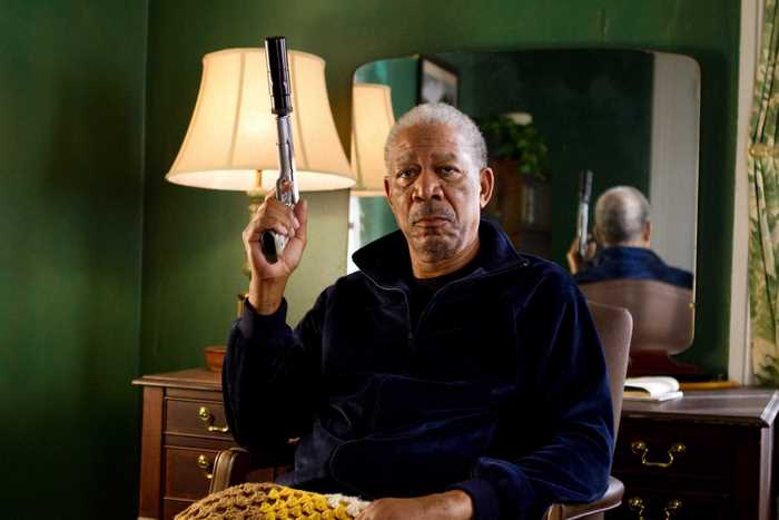 Morgan Freeman holding a gun