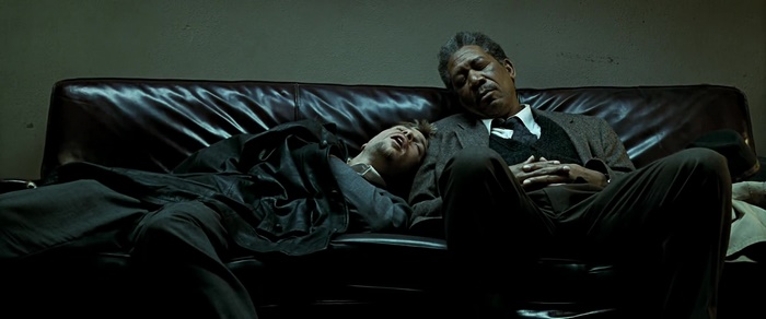 Morgan Freeman and Brad Pitt sleeping on a couch