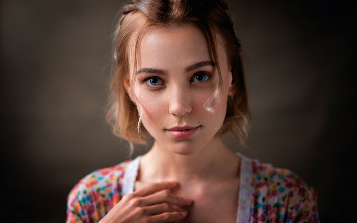 Woman with blonde hair and blue eyes