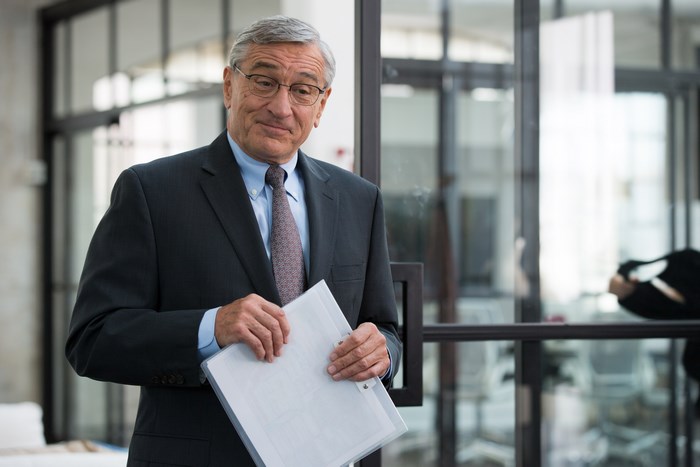 Robert De Niro holding documents