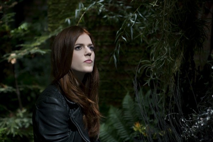 Rose Leslie in a dark forest