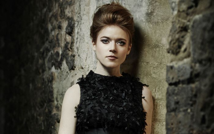 Rose Leslie in black dress