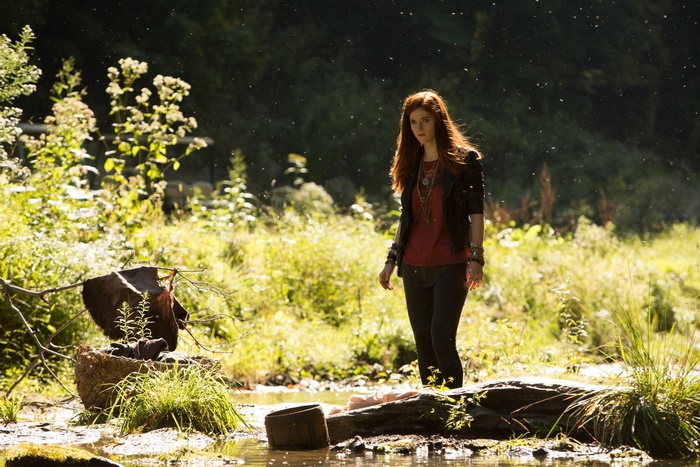Rose Leslie in a forest