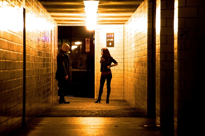 Rose Leslie in a subway tunnel
