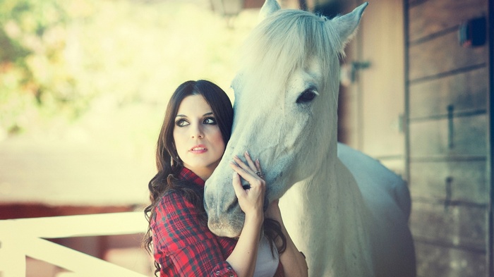 Woman with a white horse