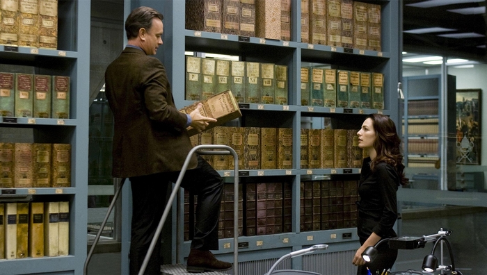 Tom Hanks in a library with a woman