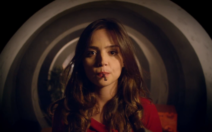 Jenna Coleman with a screw in her mouth